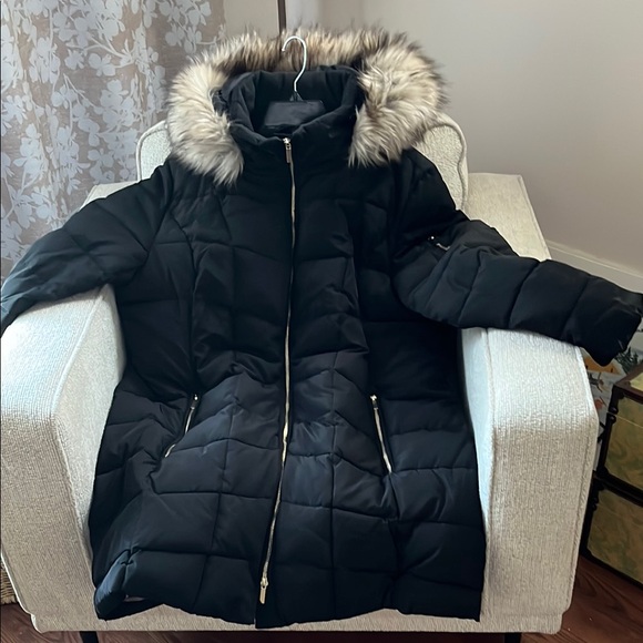 Ricki's Jackets & Blazers - Ricki’s Women's Black Quilted Coat with Faux Fur Hood like new.